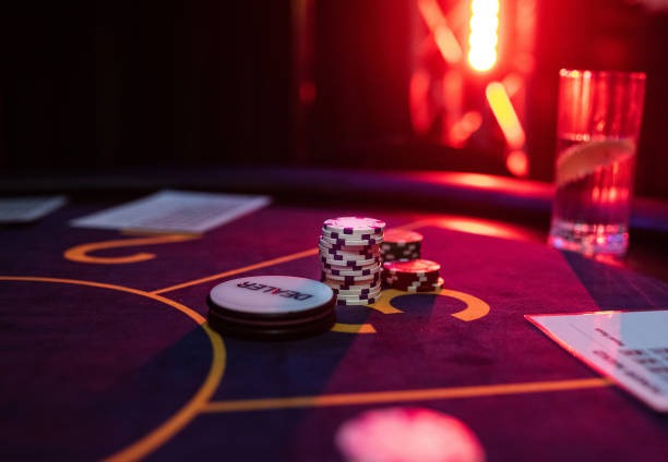 Live blackjack dealer at hukumtoto login studio with multi-camera setup
